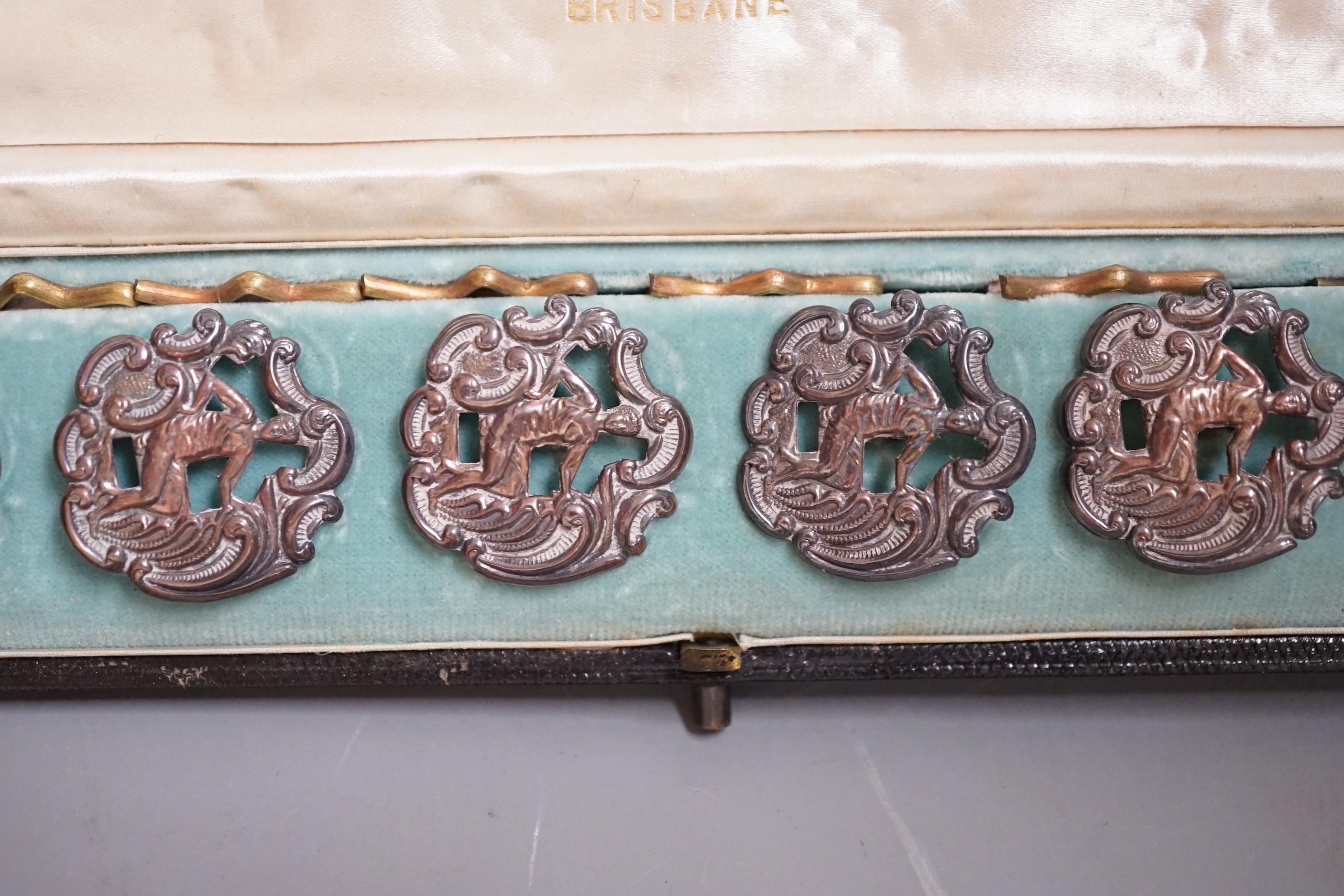 A cased set six late Victorian pierced silver dress buttons, depicting a gentleman wearing a toga, Levi & Salaman, Birmingham, 1899, 25mm.